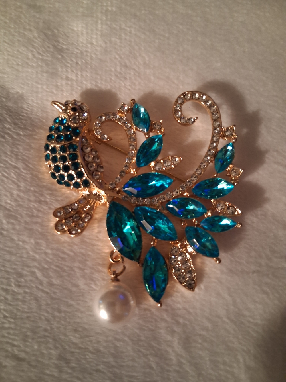 Gold Peacock Brooch with Teal Blue Crystals and Pearl Accent
